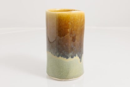 Slip Made Hand Finished Hand Decorated Tumbler:Small Vase Decorated With Our Floating Orange Over Green Glaze 1