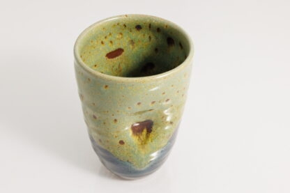 Hand Made Wheel Thrown Manipulated Vase Decorated In Our Wacky Wombat Glaze On Black Clay 10