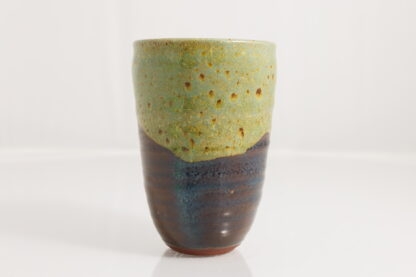Hand Made Wheel Thrown Manipulated Vase Decorated In Our Wacky Wombat Glaze On Black Clay 4