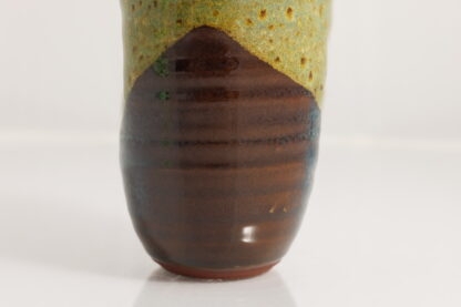 Hand Made Wheel Thrown Manipulated Vase Decorated In Our Wacky Wombat Glaze On Black Clay 8