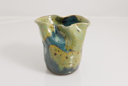 Hand Made Manipulated Wheel Throw Art Vase Decorated In Our specialty Glaze 1