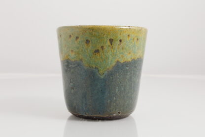 Hand Made Wheel Thrown Art Vase Decorated In Our Our Blue and Green Cover Glazes On Black Grogged Clay