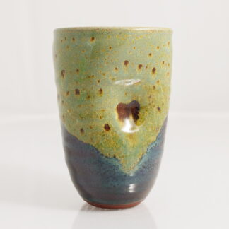 Hand Made Wheel Thrown Manipulated Vase Decorated In Our Wacky Wombat Glaze On Black Clay 1