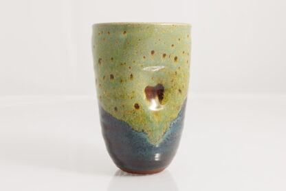 Hand Made Wheel Thrown Manipulated Vase Decorated In Our Wacky Wombat Glaze On Black Clay 1