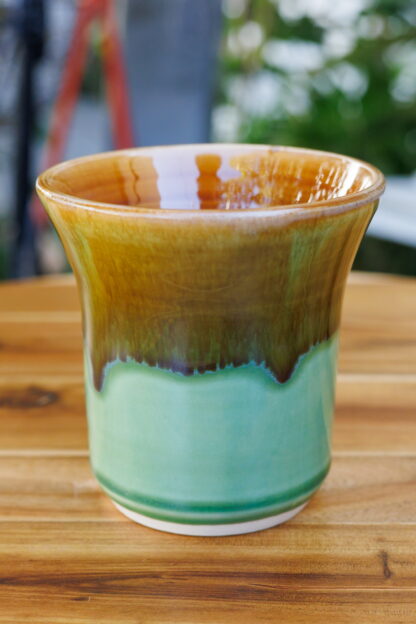 Wheel Thrown Vase Decorated In Our Light Green Base With An Orange Cover Glaze Hand Made In Melbourne