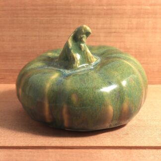 Hand Made Medium Size Pottery Pumpkin Decorated With Our Wacky Wombat Glaze On Black Clay By Tmc Pottery 1